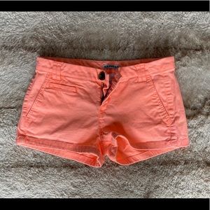 Bright orange/pink stretch shorts